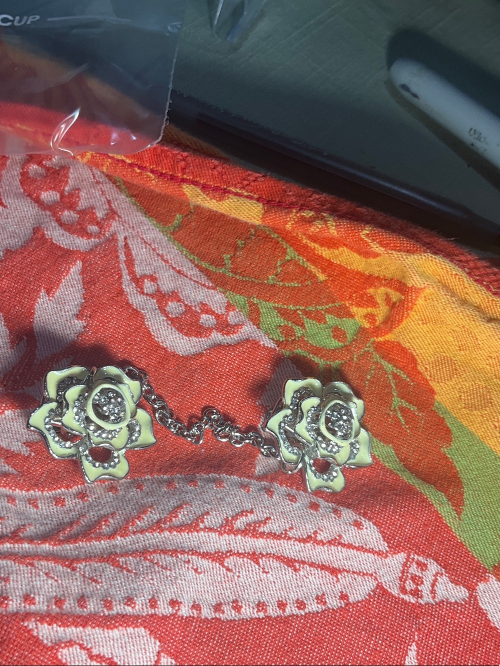 Flower sweater clip in Pale Yellow with Rhinestone centers